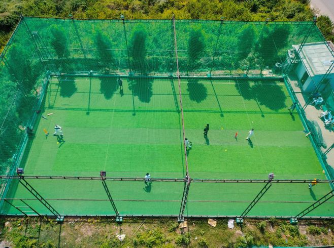 Players checking flexible booking options at a budget friendly box cricket near me facility for convenient and affordable cricket sessions.